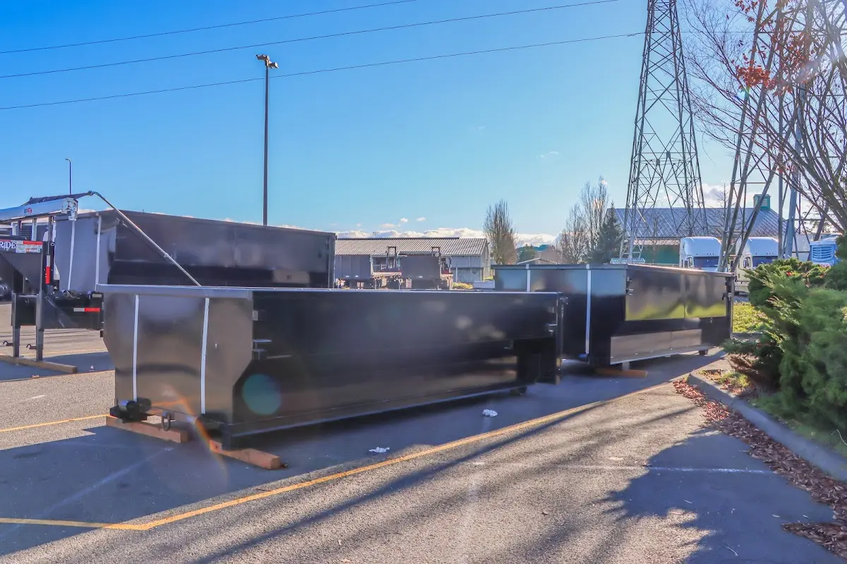 Roll-off dumpster ready for waste disposal at job site for 15 Yard Dumpster Rental in Royal Oak